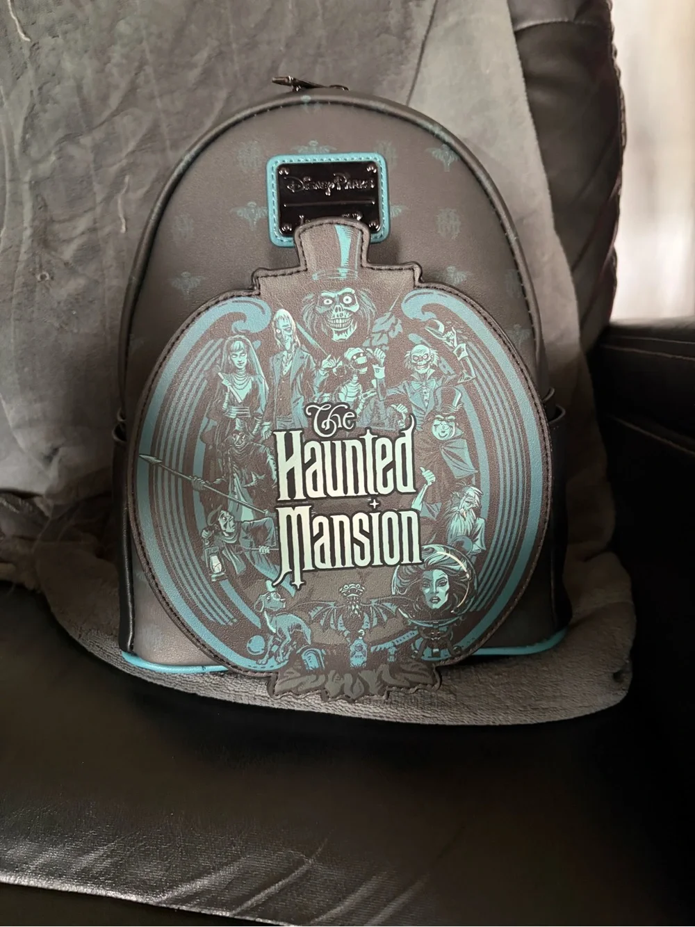 Loungefly Haunted Mansion Glow in the Dark Mini Backpack in Black and Teal